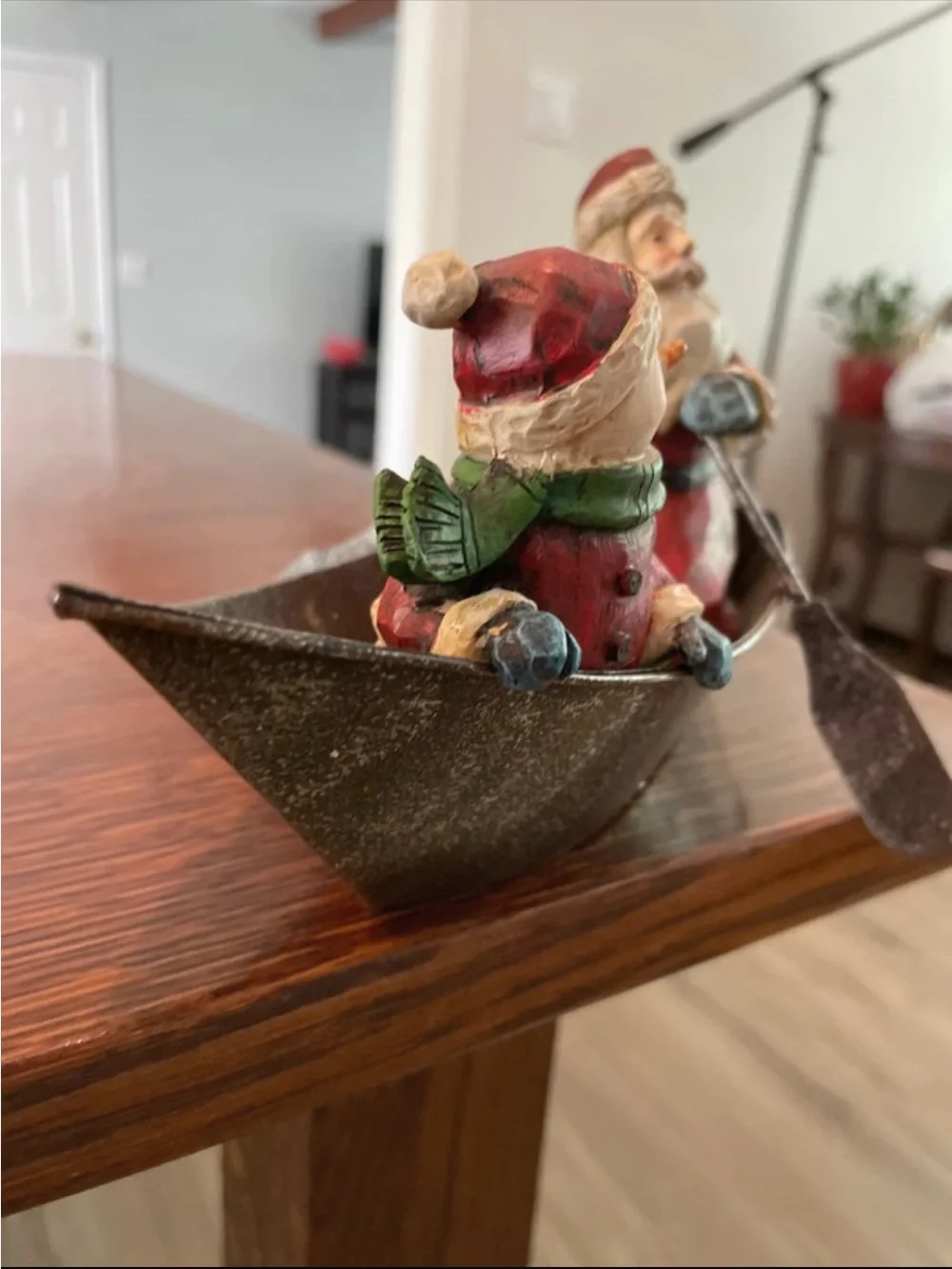 Santa and Snowman in metal fishing boat